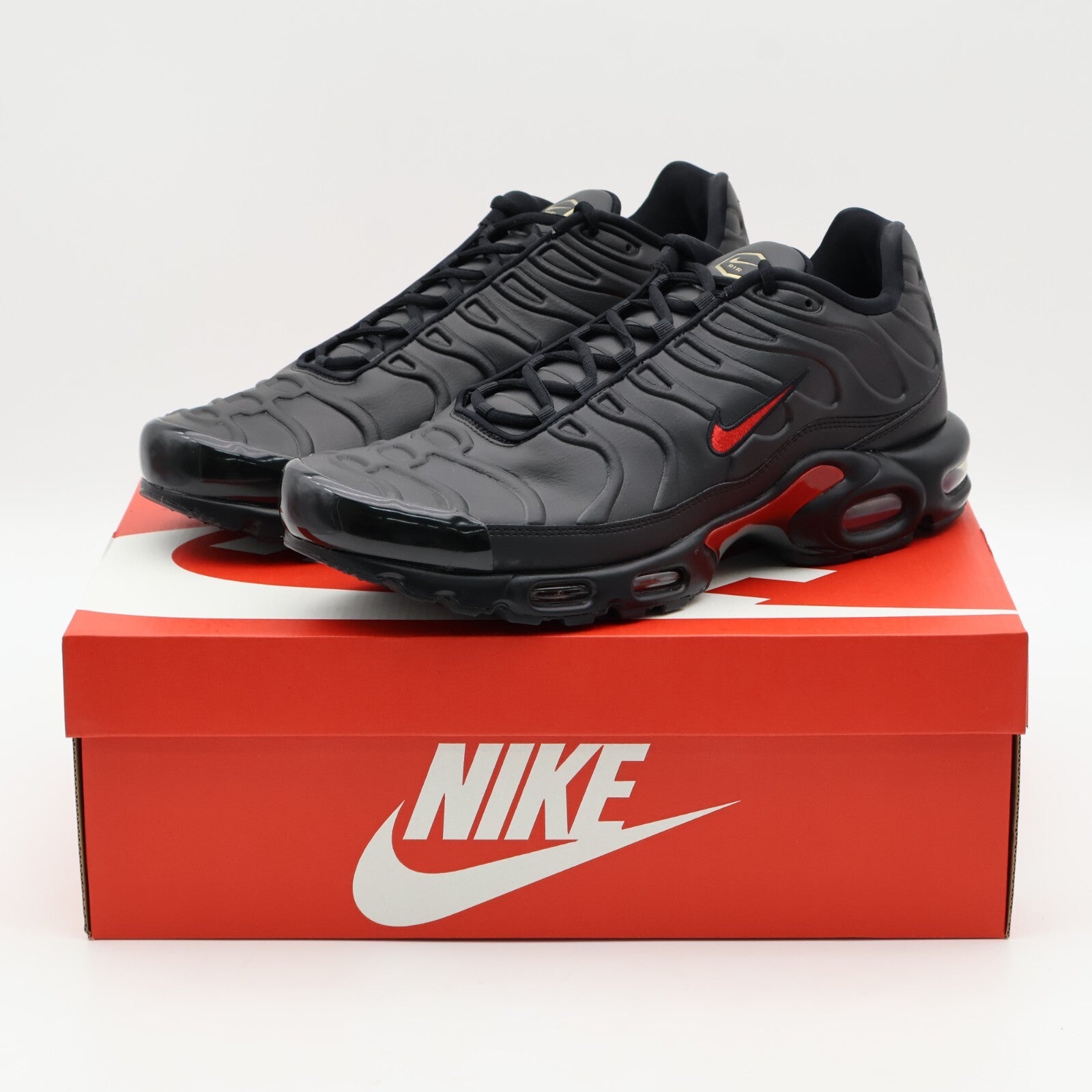 FZ3038-001 Nike Air Max Plus Premium Black Metallic Gold University Red (Men's)