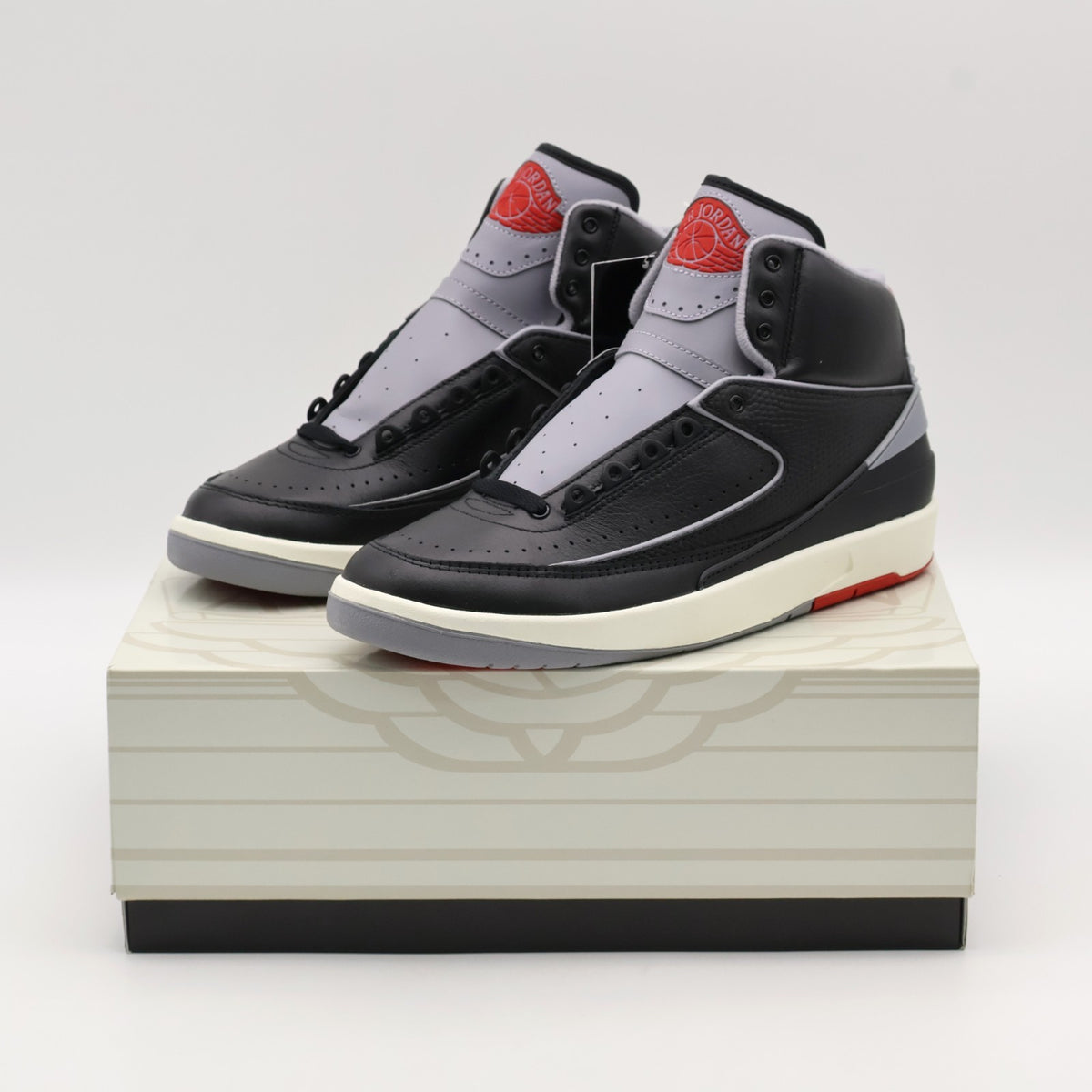 DR8884-001 Nike Air Jordan 2 Retro Black Cement Fire Red Sail Grey (Men's)