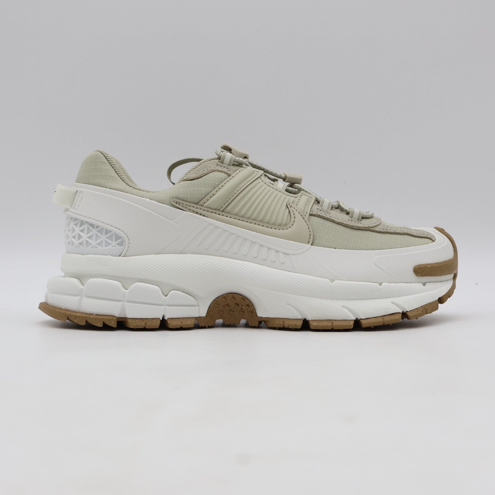 HQ2181-100 Nike Zoom Vomero Roam Sail Gum Light Brown Racer Blue (Women's)