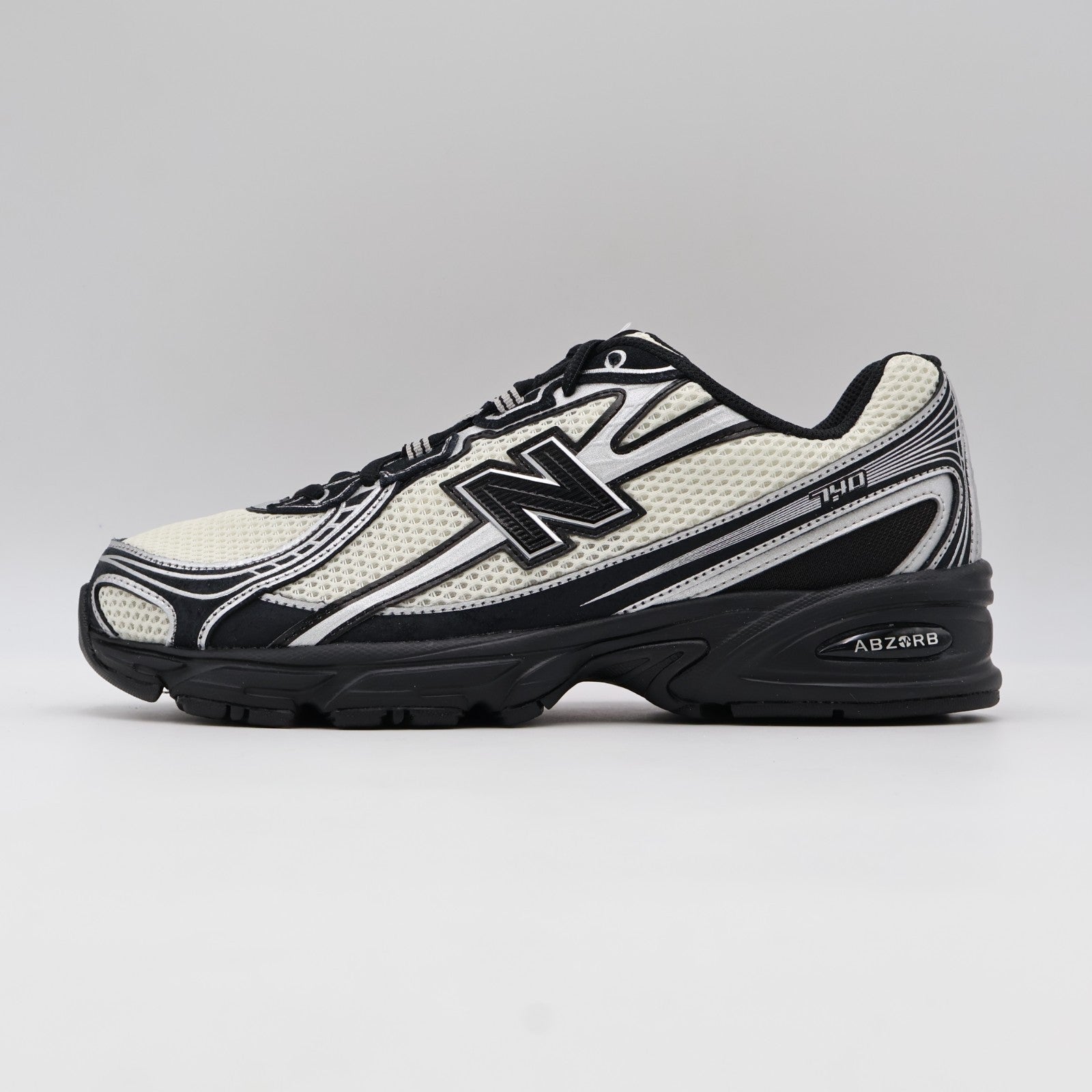 U7407XT New Balance 740 Black/Angora/Silver Metallic (Men's)
