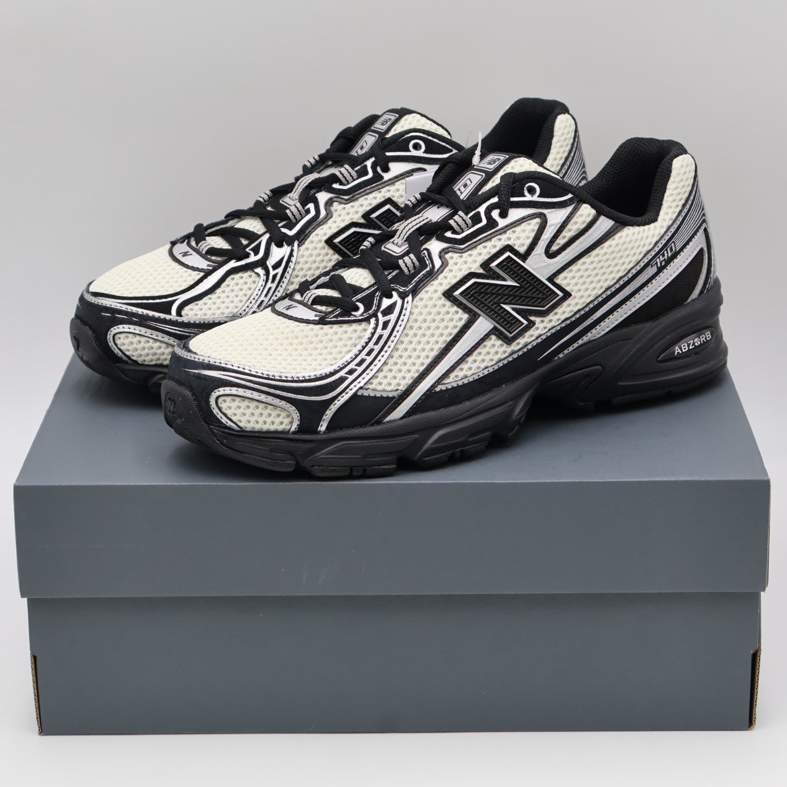 U7407XT New Balance 740 Black/Angora/Silver Metallic (Men's)