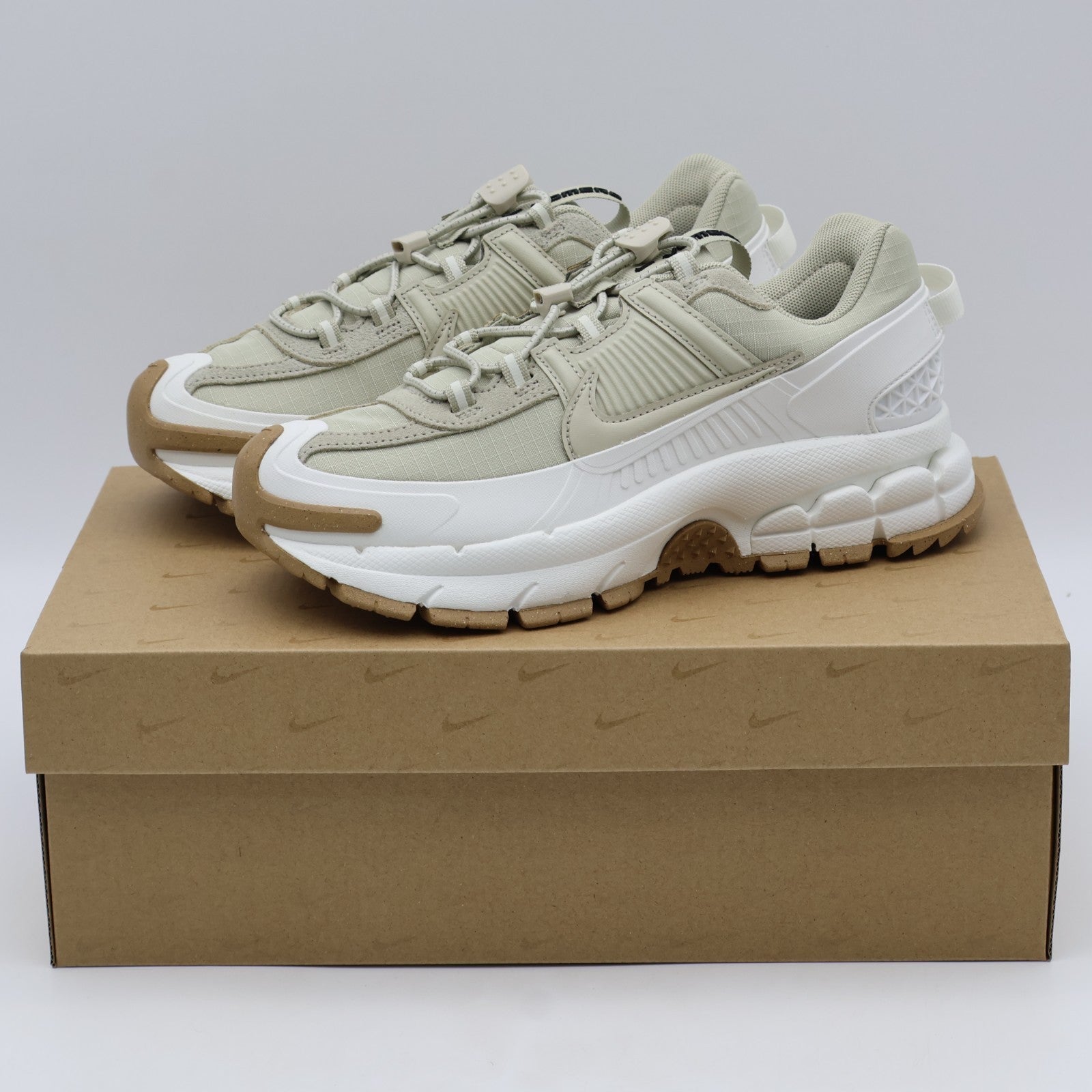 HQ2181-100 Nike Zoom Vomero Roam Sail Gum Light Brown Racer Blue (Women's)