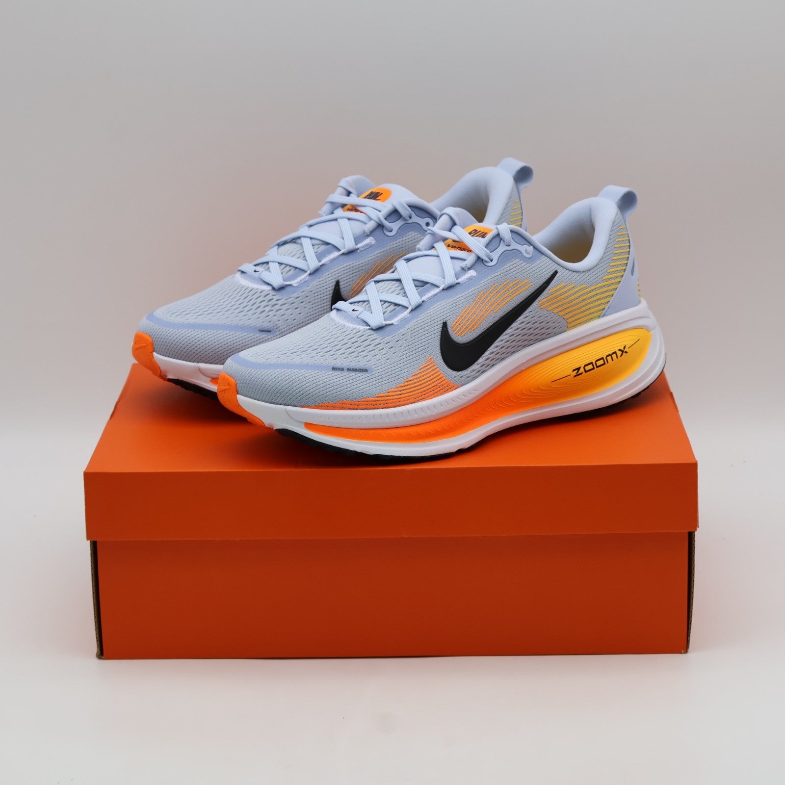HM6803-404 Nike Vomero 18 "Hydrogen Blue/Laser Orange" (Men's)