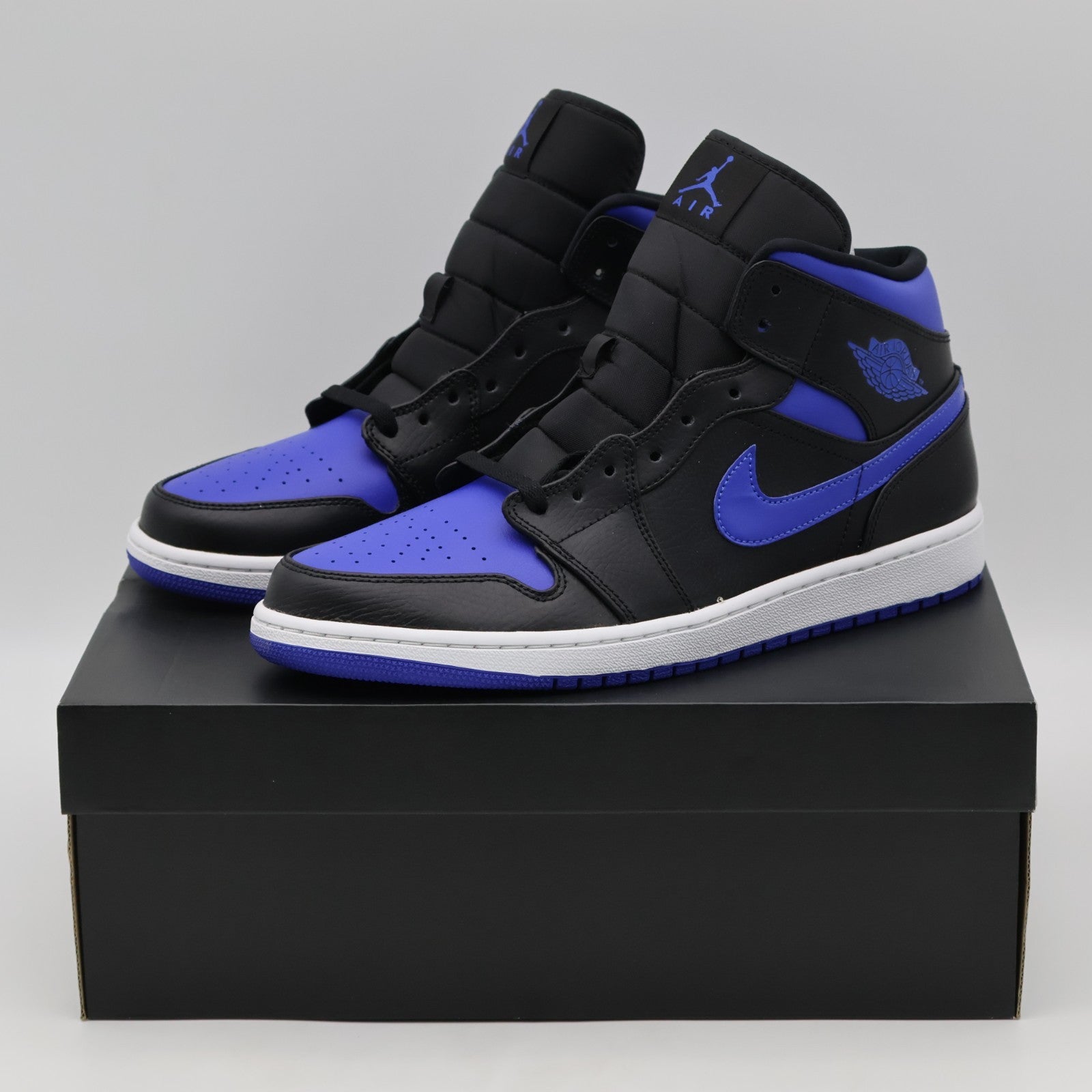 554724-068 NIKE AIR JORDAN 1 MID BLACK BLUE (Men's)