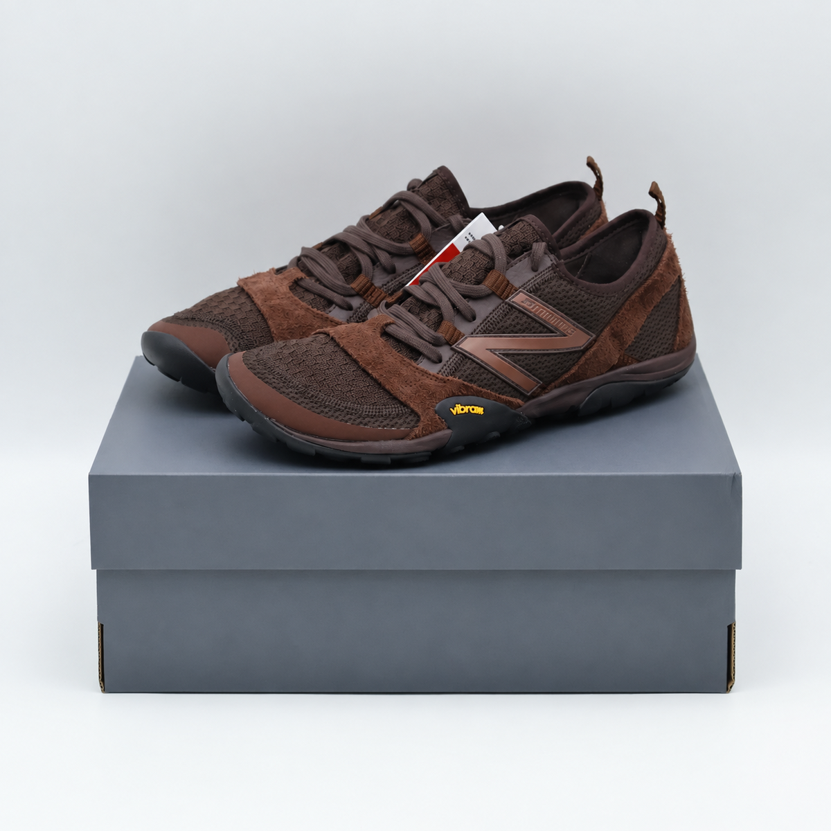 MT10O3XB New Balance MT10 "Black Coffee/Rich Oak" (Men's)