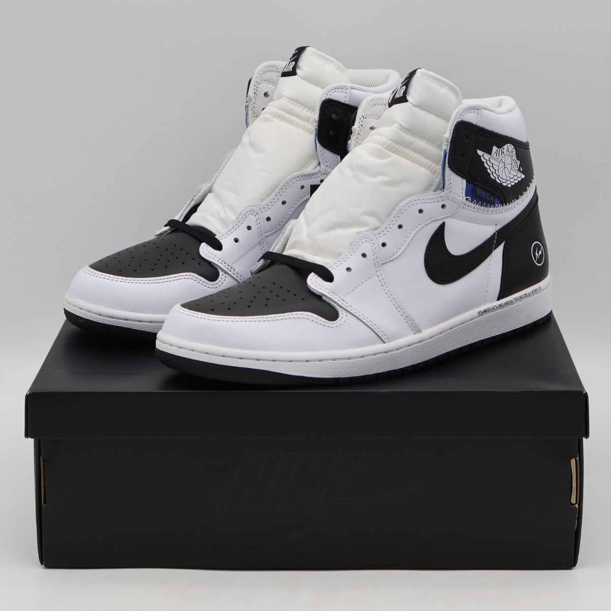 II7282-100 fragment design à UNION à Nike Air Jordan 1 Retro High OG (Men's)