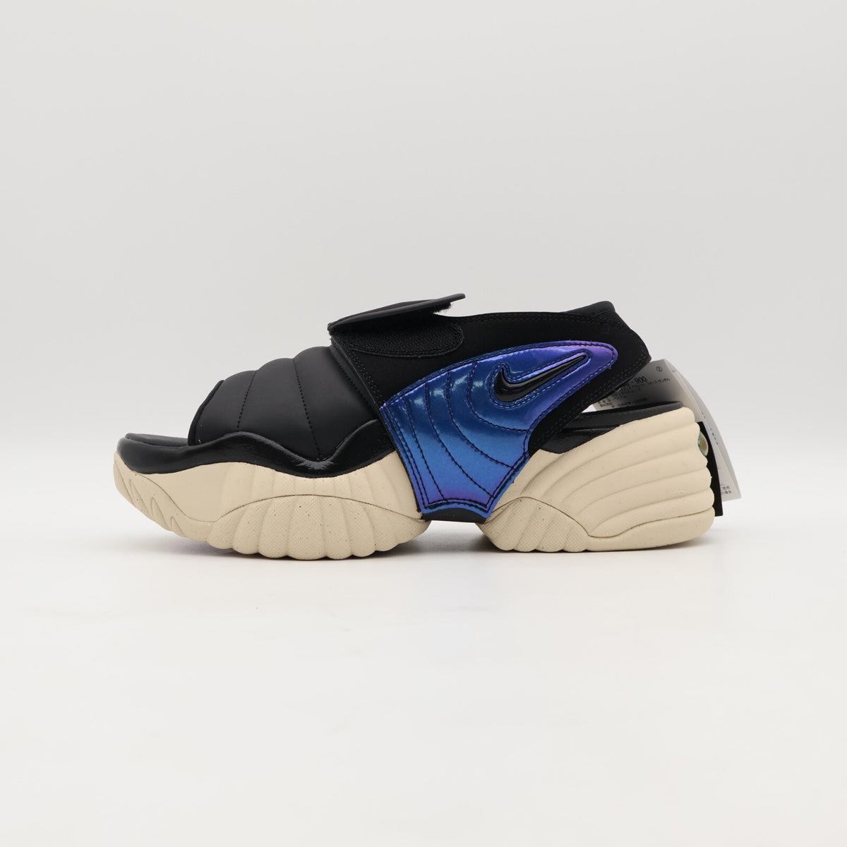 DV2136-900 Nike Air Adjust Force Sandal Black and Sanddrift (Women's)