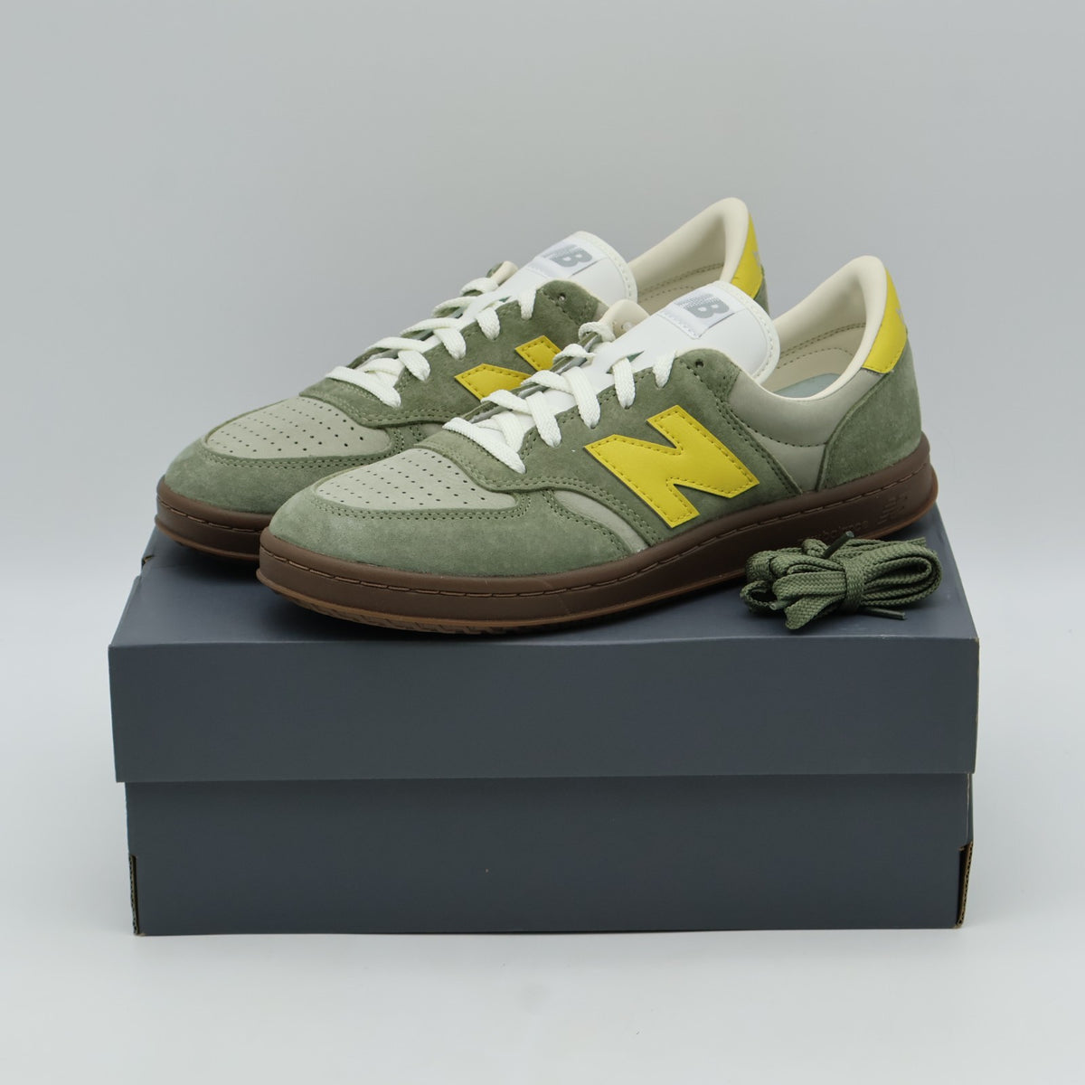 M5009M6 New Balance T500 Dark Olvine/Apollo Gold (Men's)