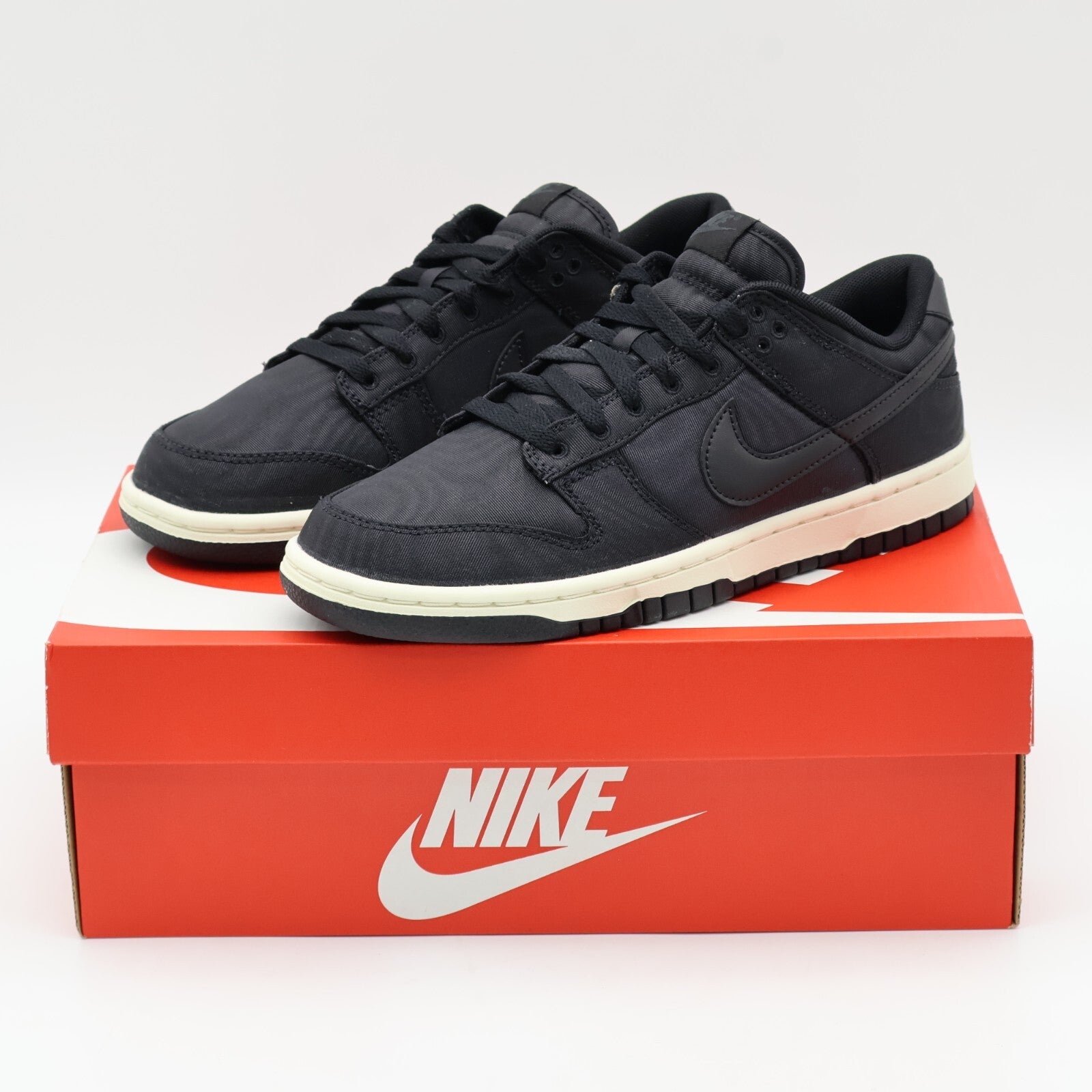 DV7211-001 Nike Dunk Low Retro PRM Black Sail Canvas (Men's)