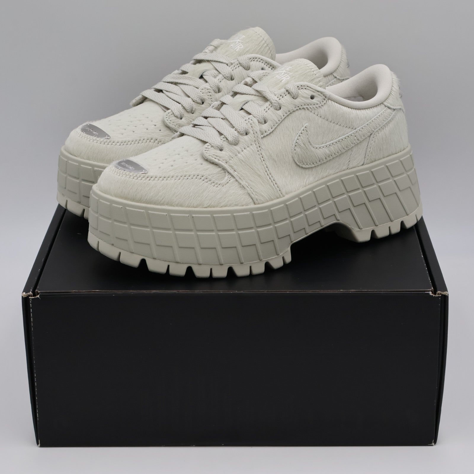 IB7210-001 Nike Air Jordan 1 Brooklyn Low Light Bone Metallic Silver (Women's)