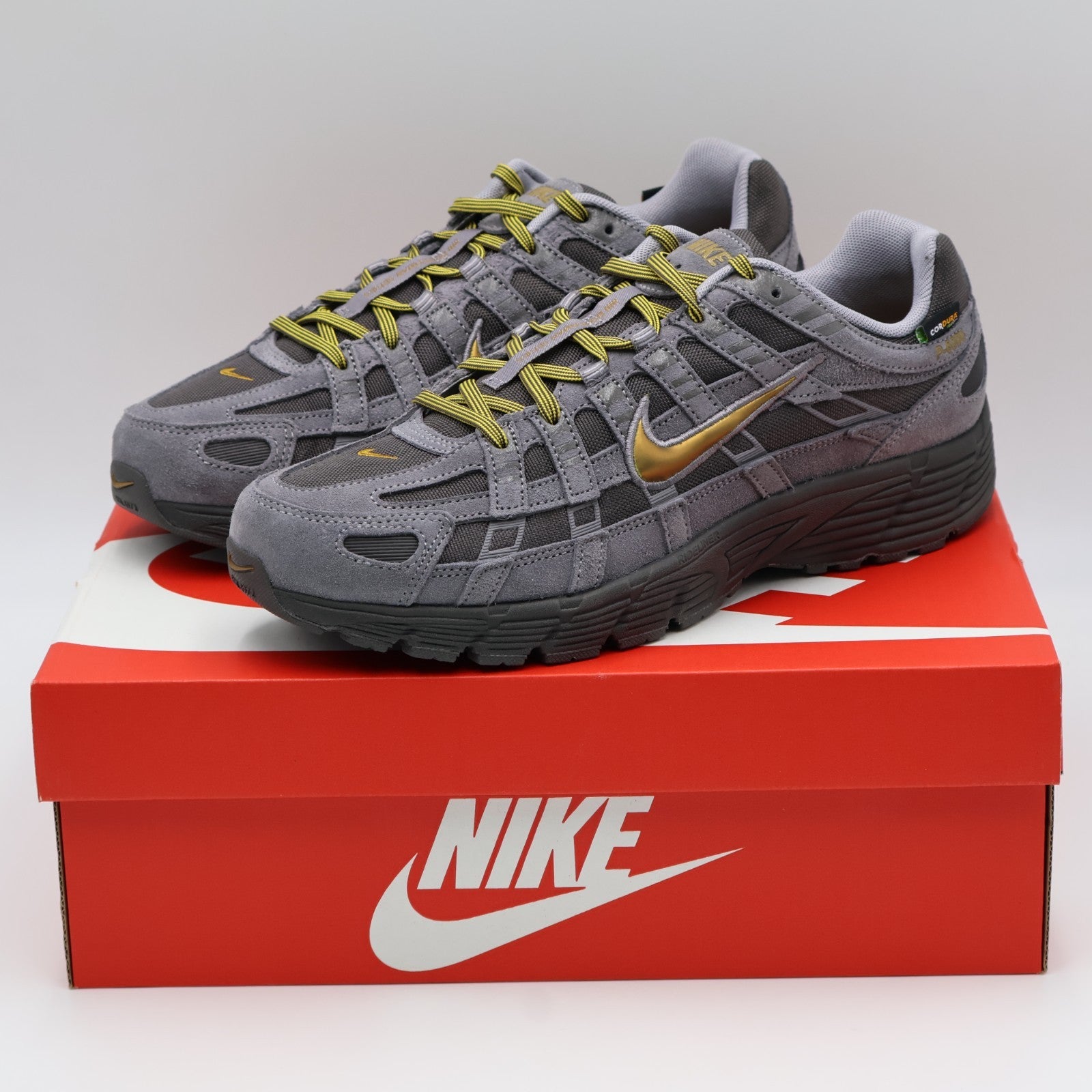 IH0946-201 Nike P-6000 Premium Cordura Medium Ash Golden Hops (Men's)