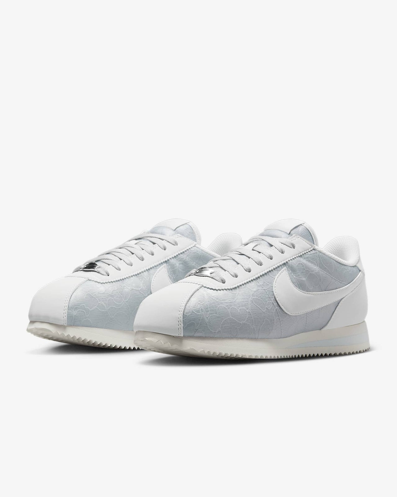 HM8286-001 Nike Cortez Platinum Tint Floral (Women's)