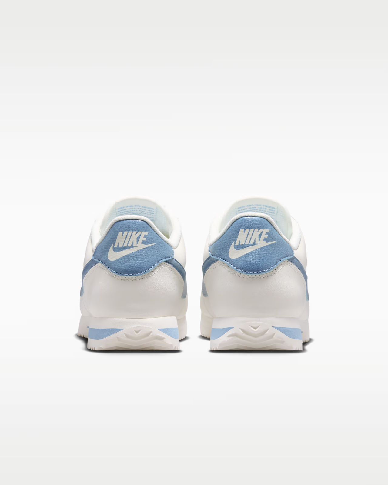 DN1791-119 Nike Cortez Leather "Sail/Work Blue" (Women's)