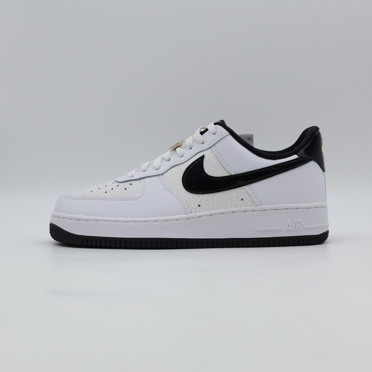 DR9866-100 Nike Air Force 1 Low '07 LV8 World Champ White and Black (Men's)
