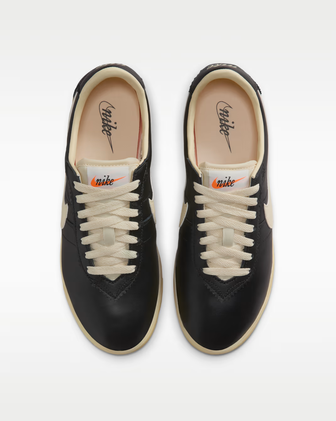 II1259-001 Nike Astro Grabber Leather Black (Women's)