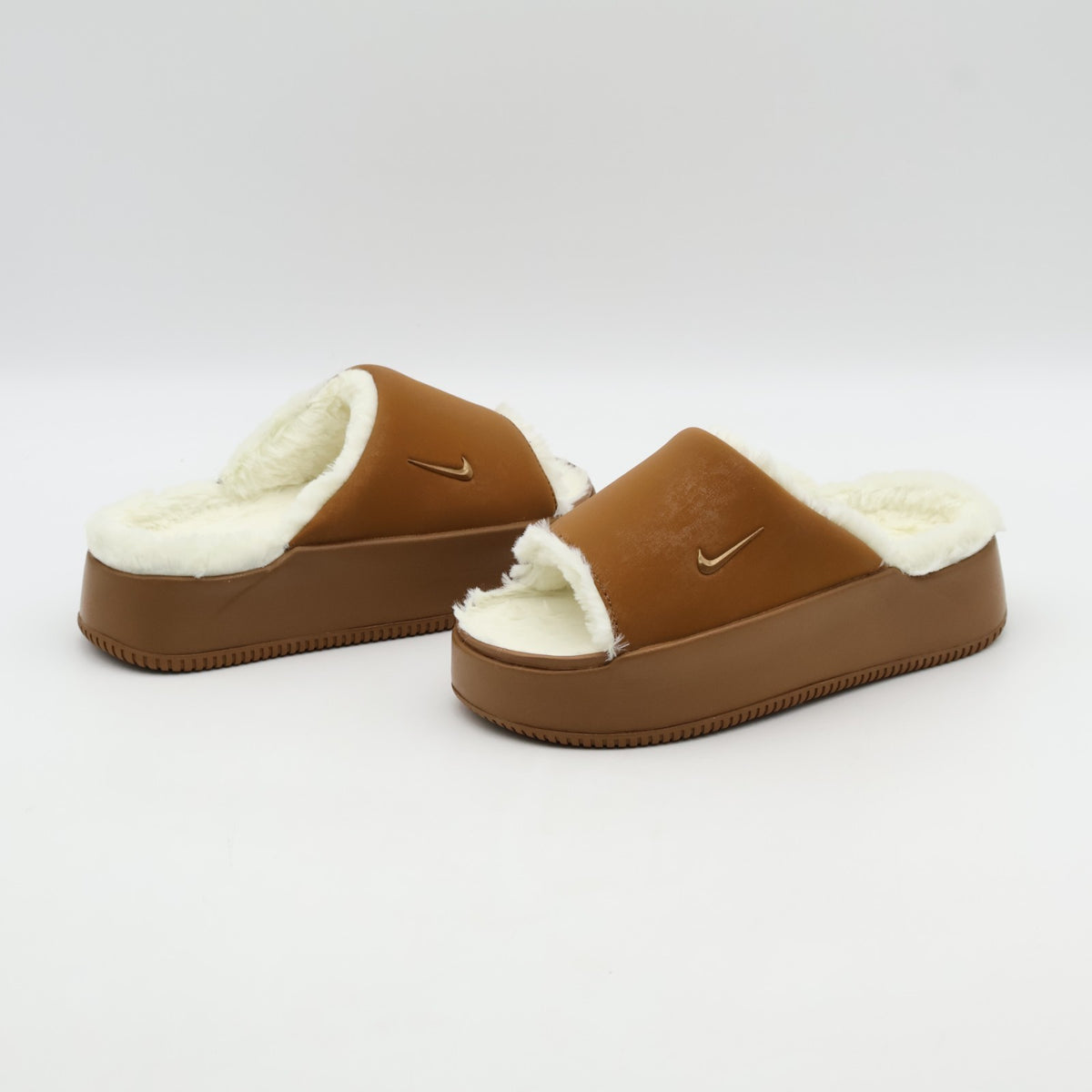 HV8560-200 Nike Calm Elevation Fur Slides Light British Tan (Women's)