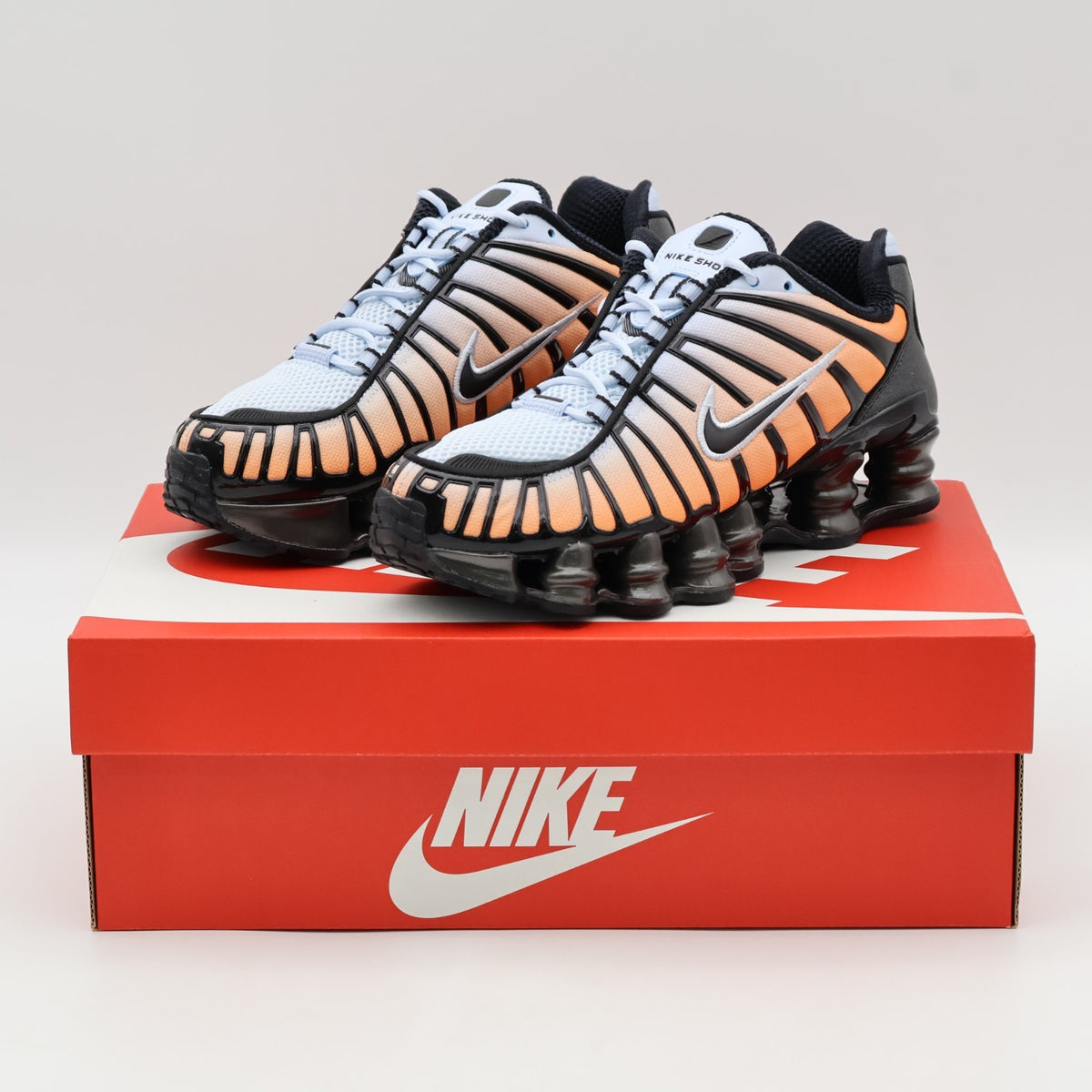AR3566-401 Nike Shox TL Blue Tint Total Orange (Women's)