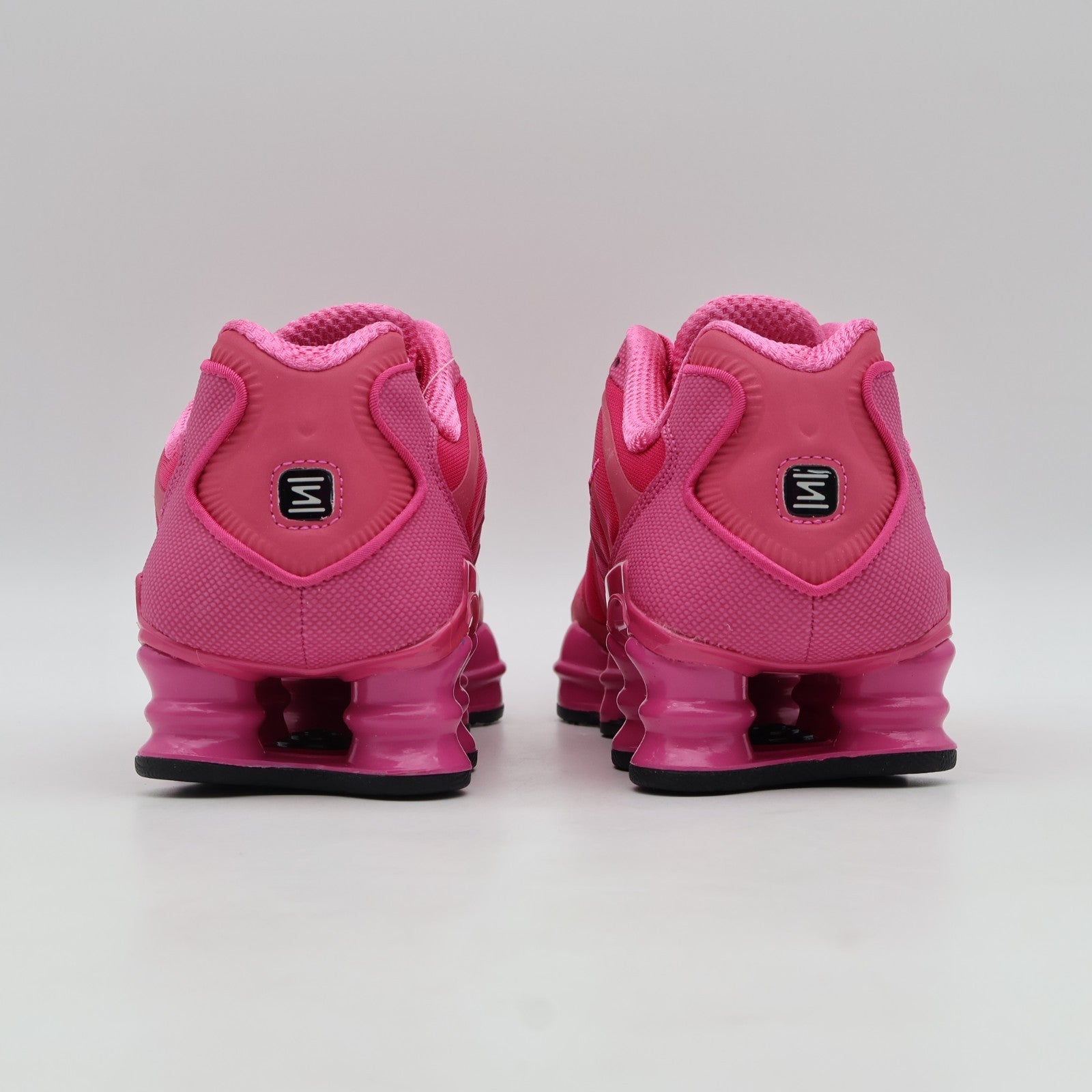 IH1338-600 Nike Shox TL Desert Pink Black (Men's)