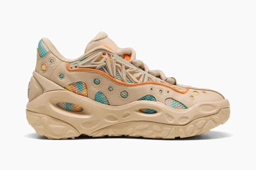 312165-01 LaMelo Ball Ã Puma La France RNR Light Sand Orange Glo Aquatic (Men's)