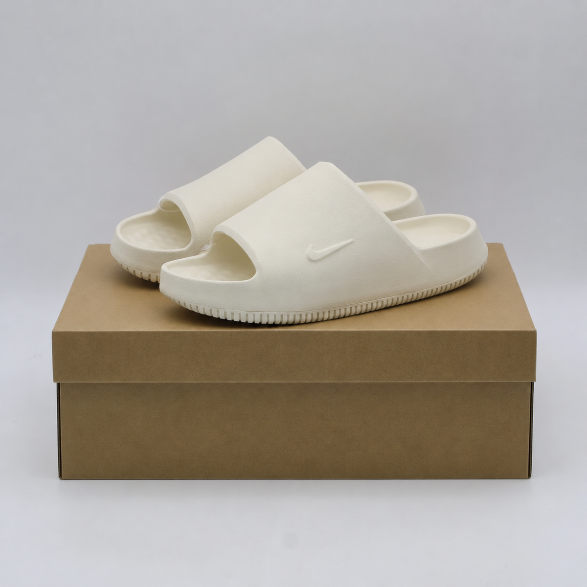 IB0183-101 Nike Calm 2.0 Slide Coconut Milk (Men's)