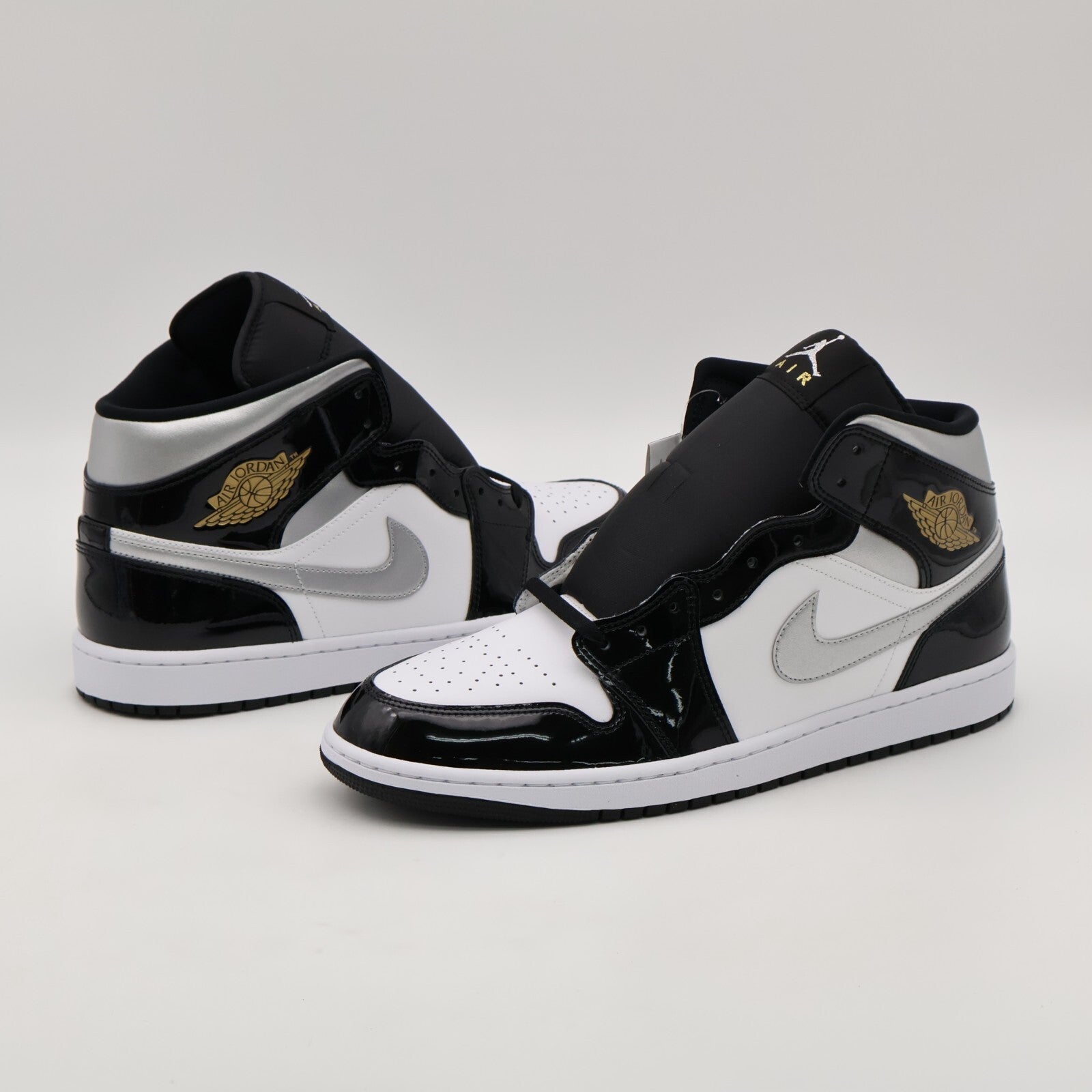 HV0789-010 Nike Air Jordan 1 Mid Black Patent (Men's)