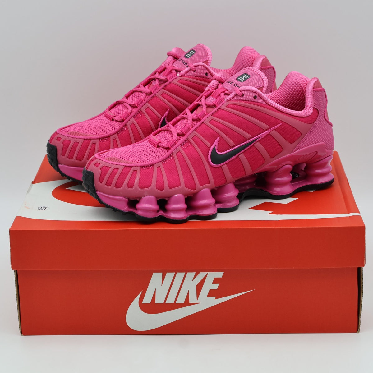 IH1338-600 Nike Shox TL Desert Pink Black (Men's)