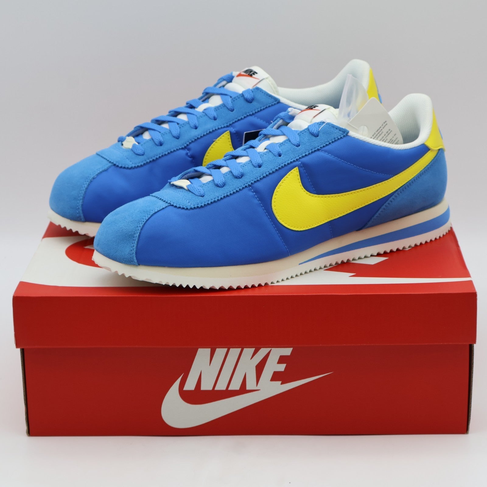 HF0263-402 Nike Cortez TXT Blue Yellow (Men's)
