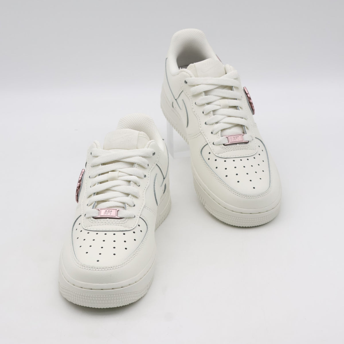 IF1686-161 Nike Air Force 1 Low Metallic Pink Swooshes (Women's)