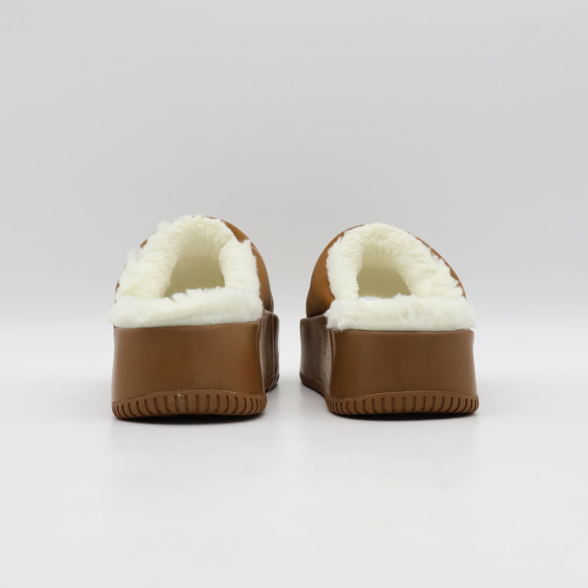 HV8560-200 Nike Calm Elevation Fur Slides Light British Tan (Women's)