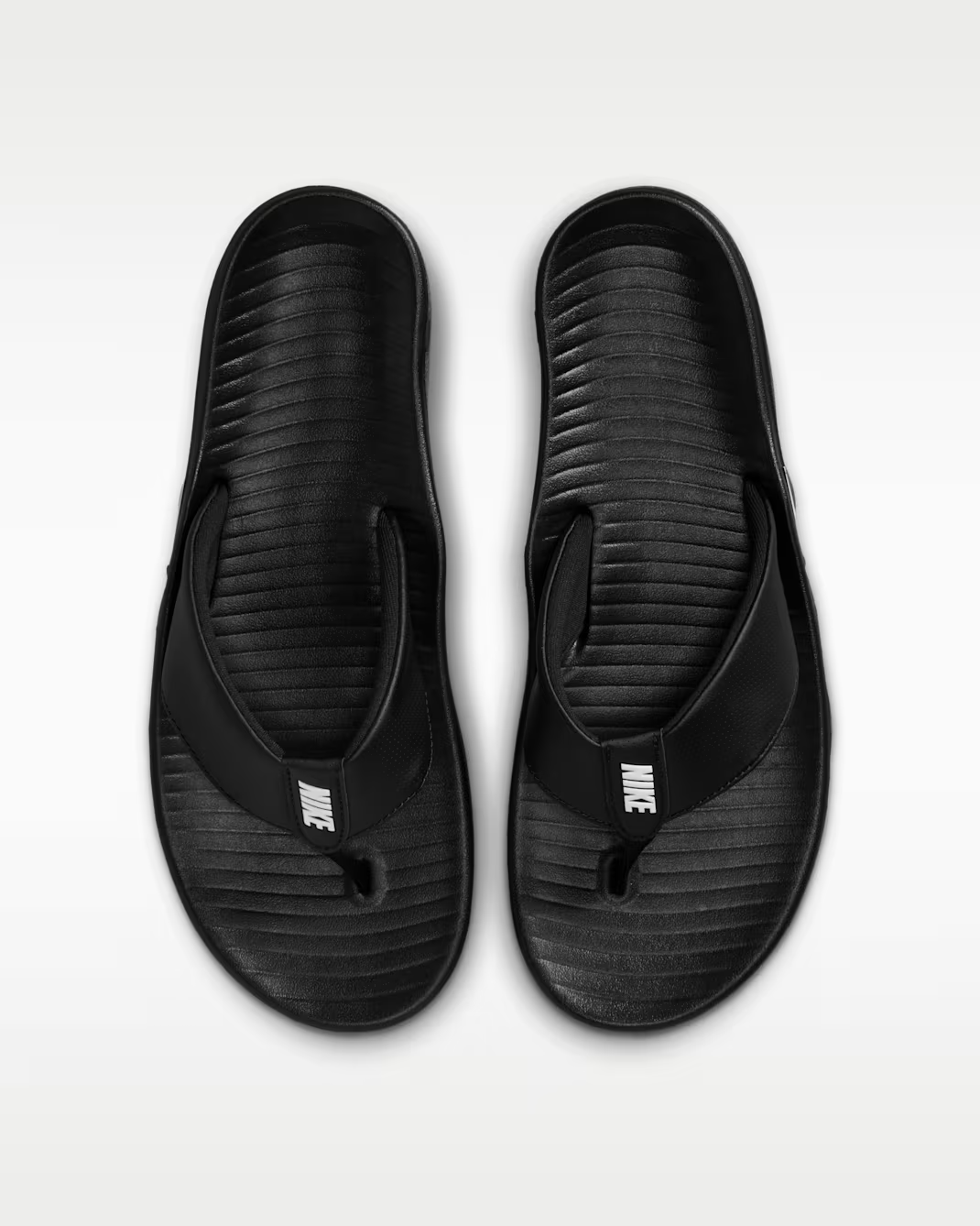 IH2380-001 Nike Marina Slide Black White (Men's)