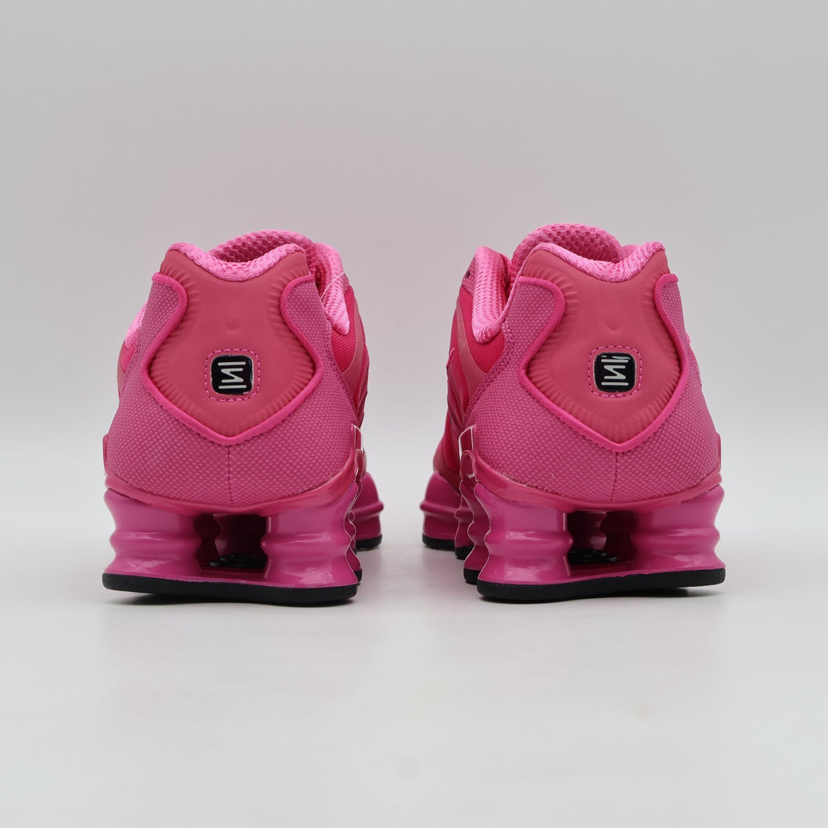 IH1338-600 Nike Shox TL Desert Pink Black (Men's)