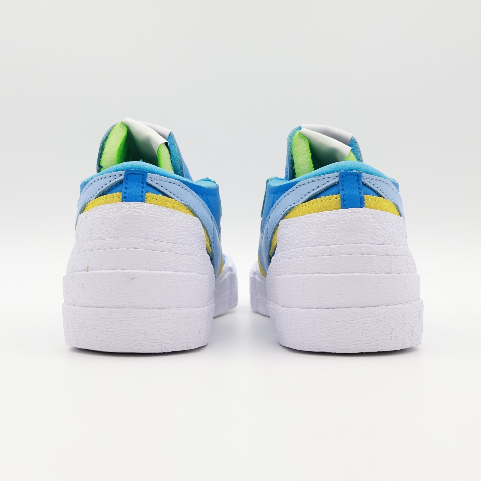 DM7901-400 KAWS sacai Nike Blazer Low Neptune Blue Light Pink Yellow (Men's)