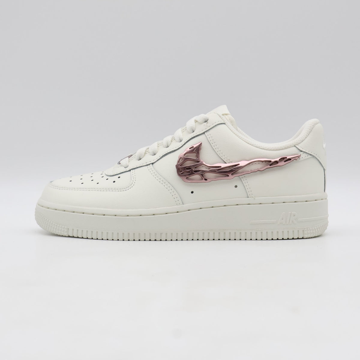 IF1686-161 Nike Air Force 1 Low Metallic Pink Swooshes (Women's)