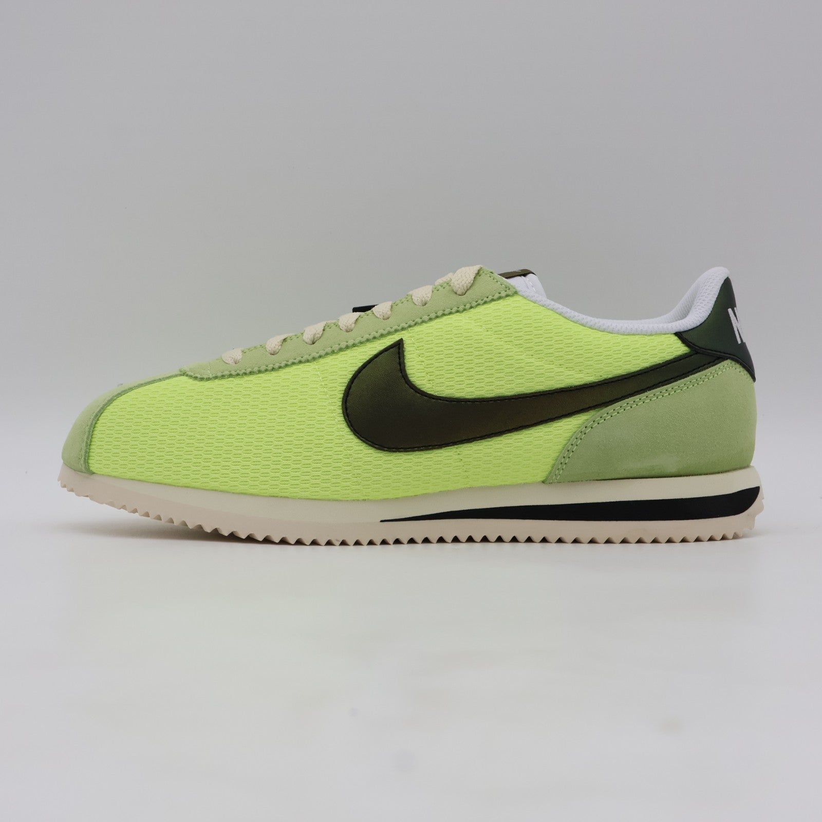 IB8135-736 NIKE CORTEZ TXT LT LEMON TWIST/BLACK-COCONUT MILK-WHITE (Men's)