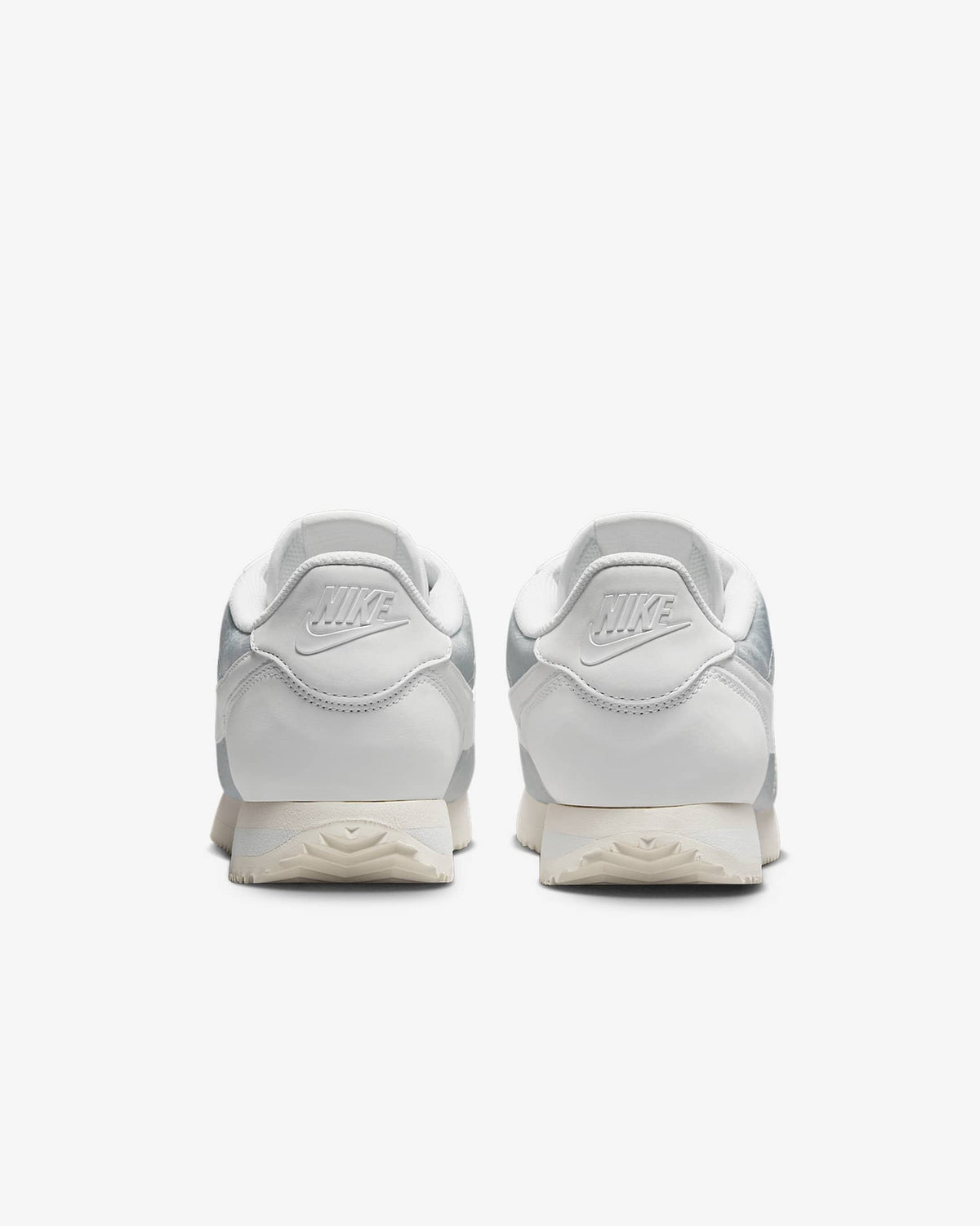 HM8286-001 Nike Cortez Platinum Tint Floral (Women's)