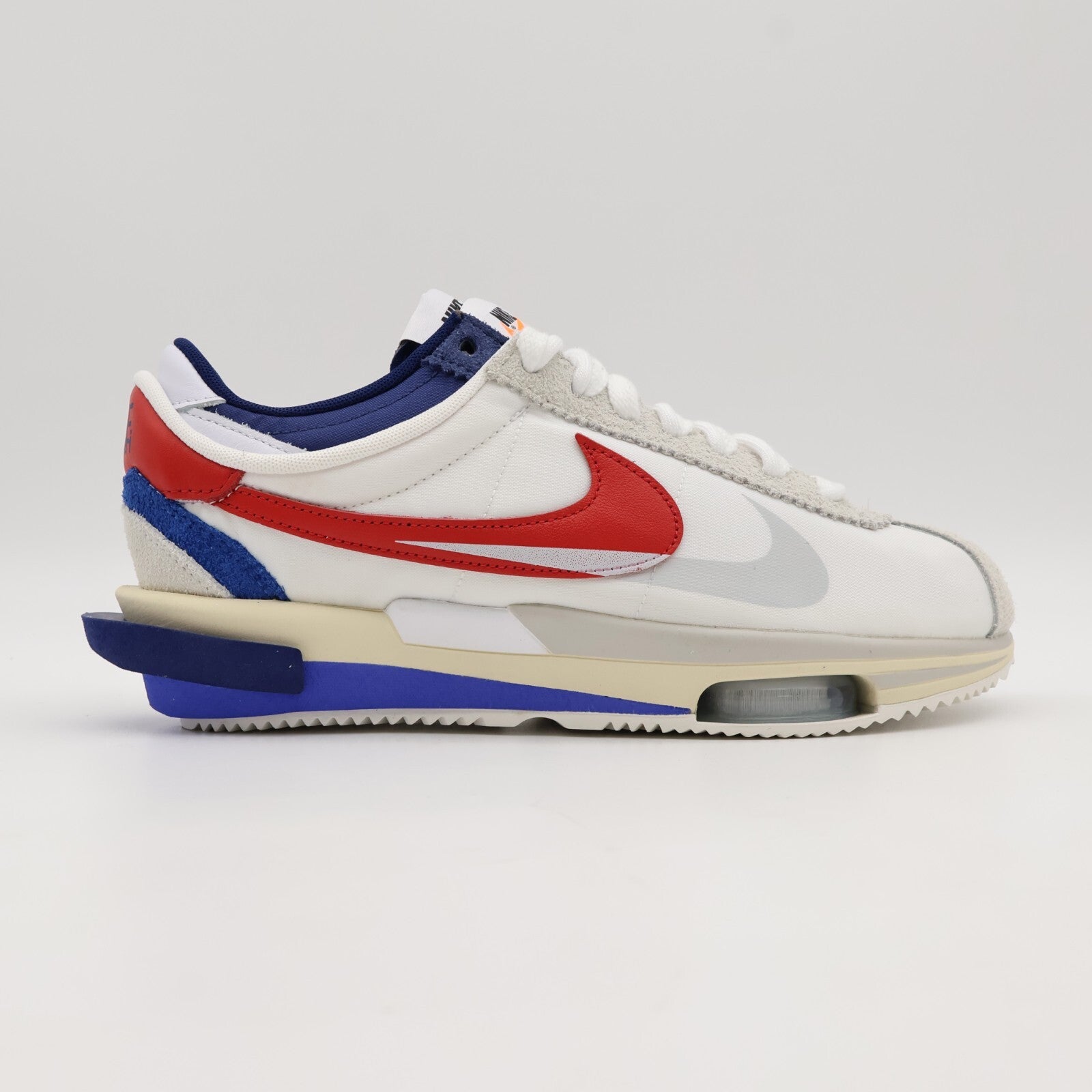 DQ0581-100 sacai Nike Zoom Cortez White University Red Blue Light Cream (Men's)