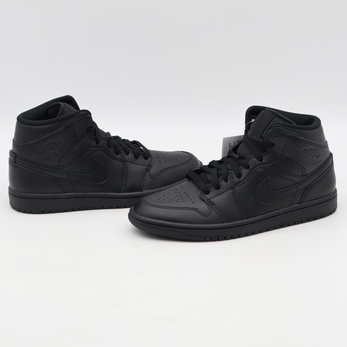554724-093 Nike Air Jordan 1 Mid Triple Black (Men's)