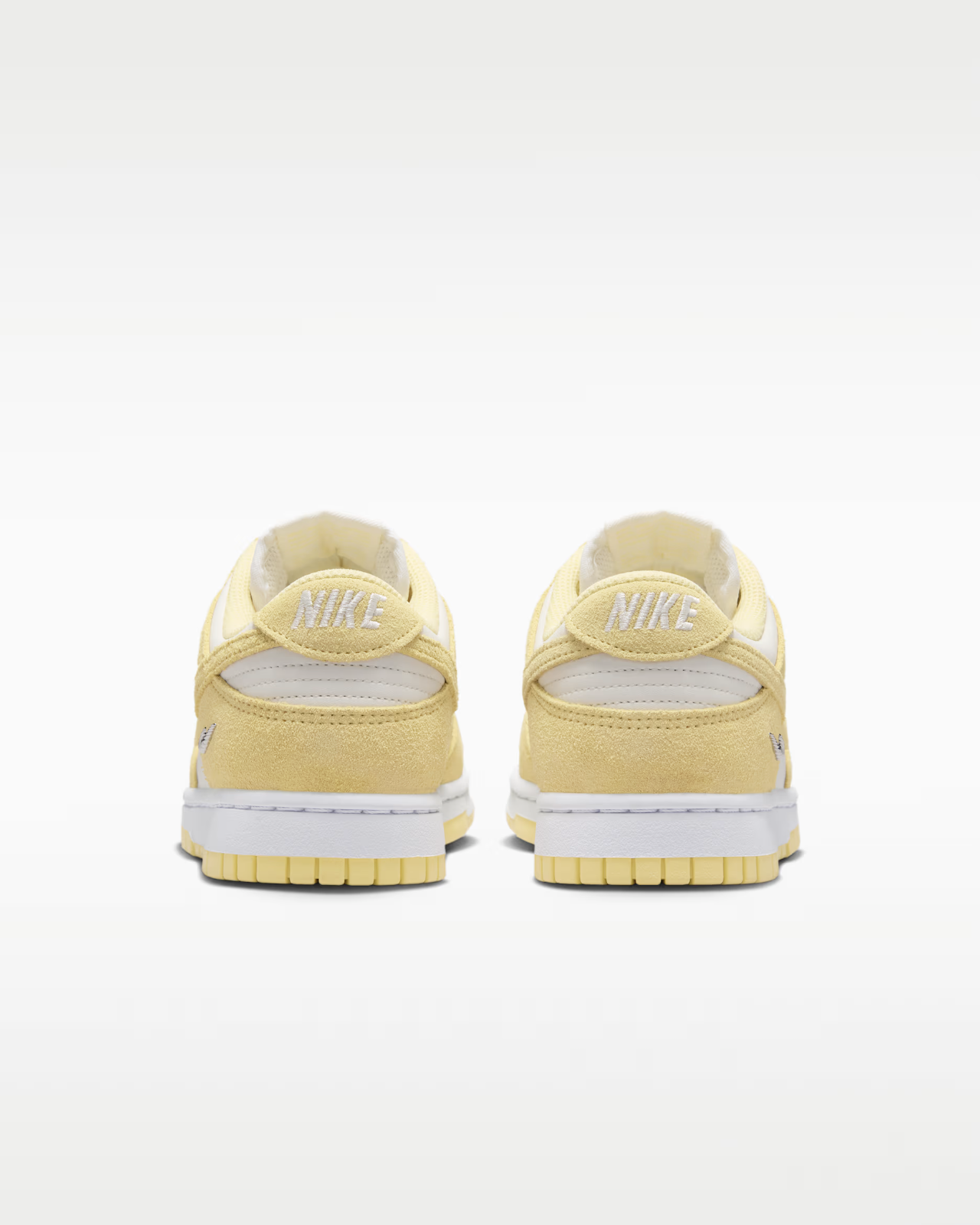 IO4244-104 Nike Dunk Low "Sail/Soft Yellow" (Women's)