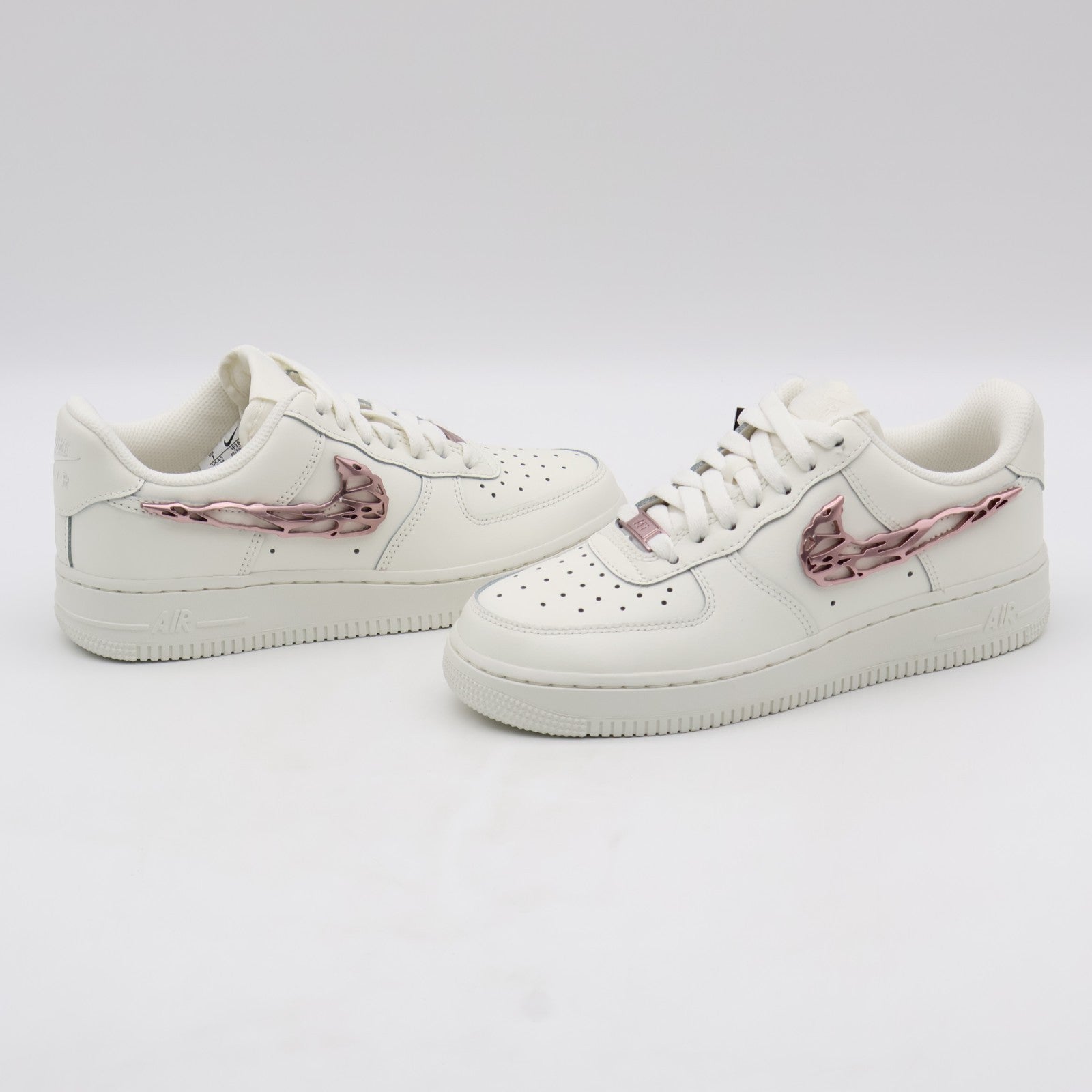IF1686-161 Nike Air Force 1 Low Metallic Pink Swooshes (Women's)