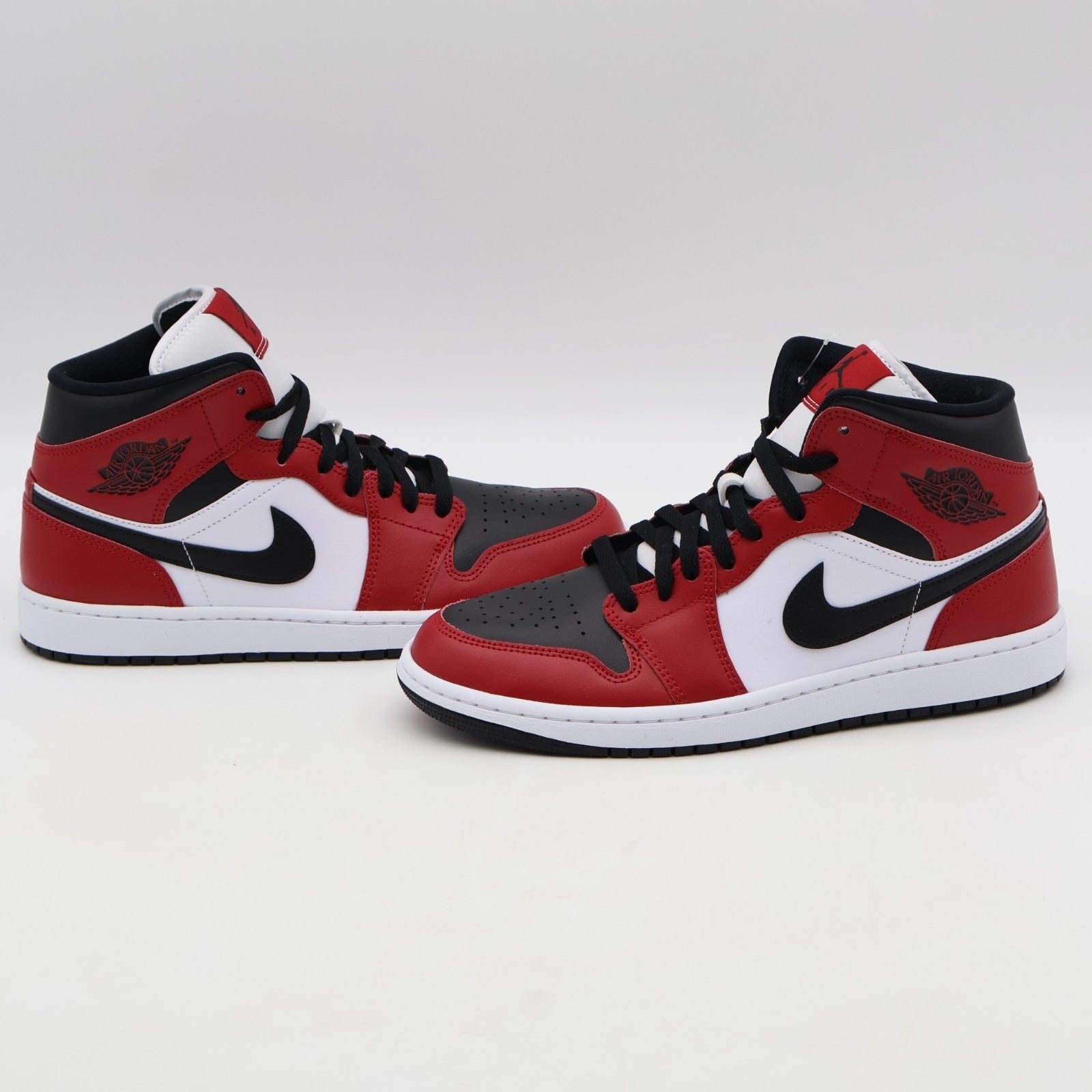 554724-069 Nike Air Jordan 1 Mid Chicago Black Toe (2025) (Men's)