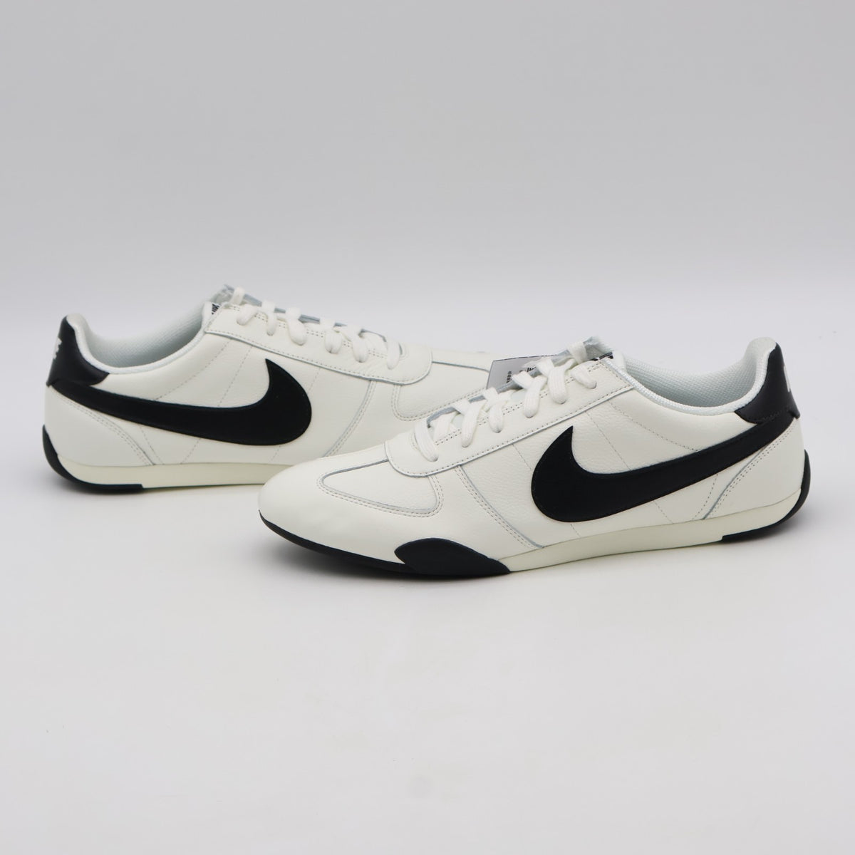IB7102-100 Nike Women's Sprint Sister SailBlack (Women's)