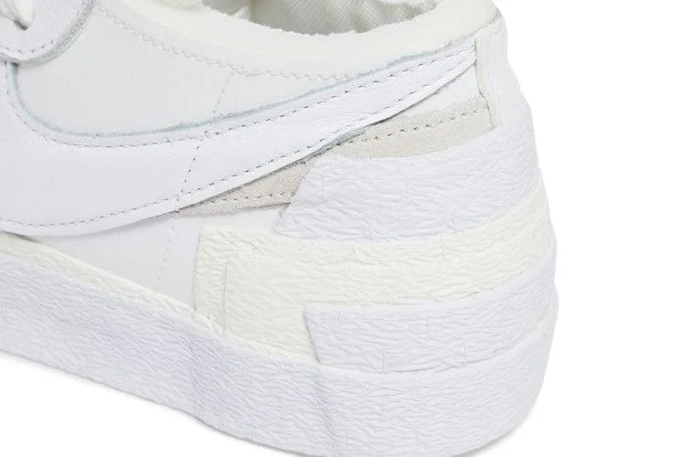 DM6443-100 sacai Ã Nike Blazer Low "White Patent Leather" (Men's)