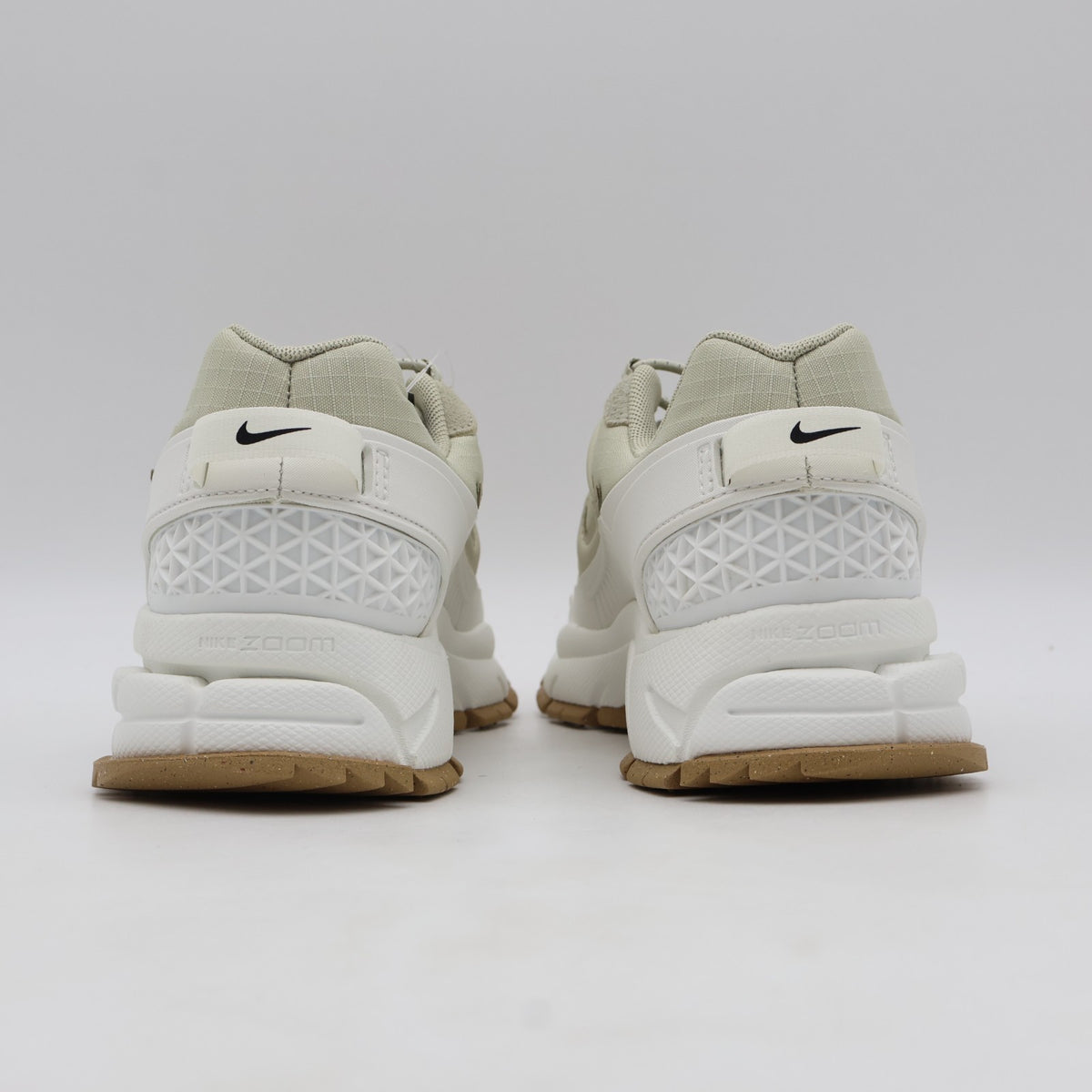 HQ2181-100 Nike Zoom Vomero Roam Sail Gum Light Brown Racer Blue (Women's)