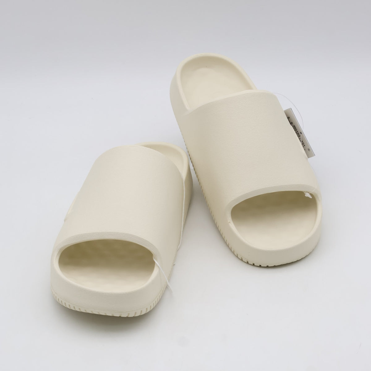 IB0183-101 Nike Calm 2.0 Slide Coconut Milk (Men's)