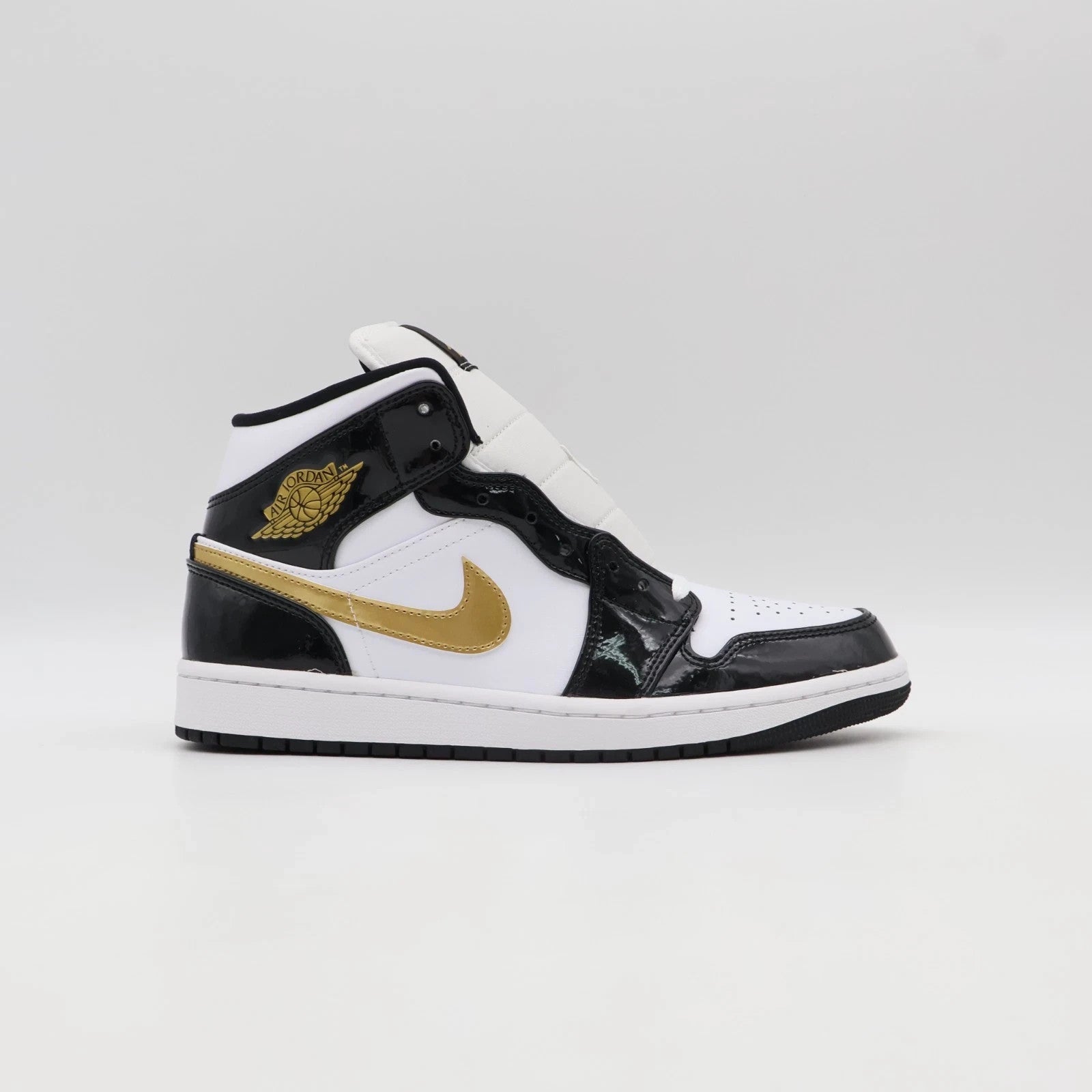 Size 11 - 852542-007 Jordan 1 Mid SE Patent Black Gold (Men's)