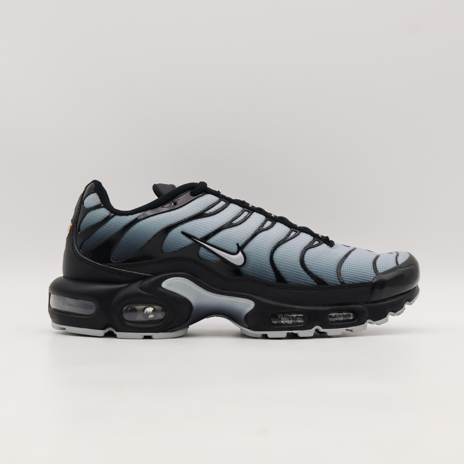 IO0657-001 Nike Air Max Plus Black Wolf Grey (Women's)