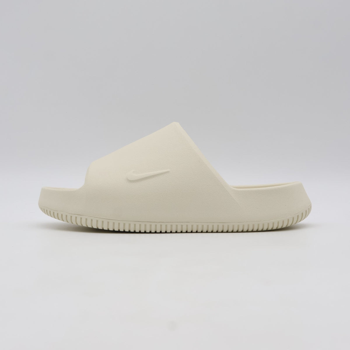 IB0183-101 Nike Calm 2.0 Slide Coconut Milk (Men's)