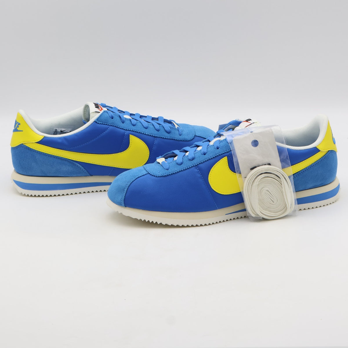 HF0263-402 Nike Cortez TXT Blue Yellow (Men's)