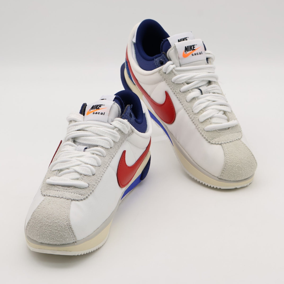 DQ0581-100 sacai Nike Zoom Cortez White University Red Blue Light Cream (Men's)