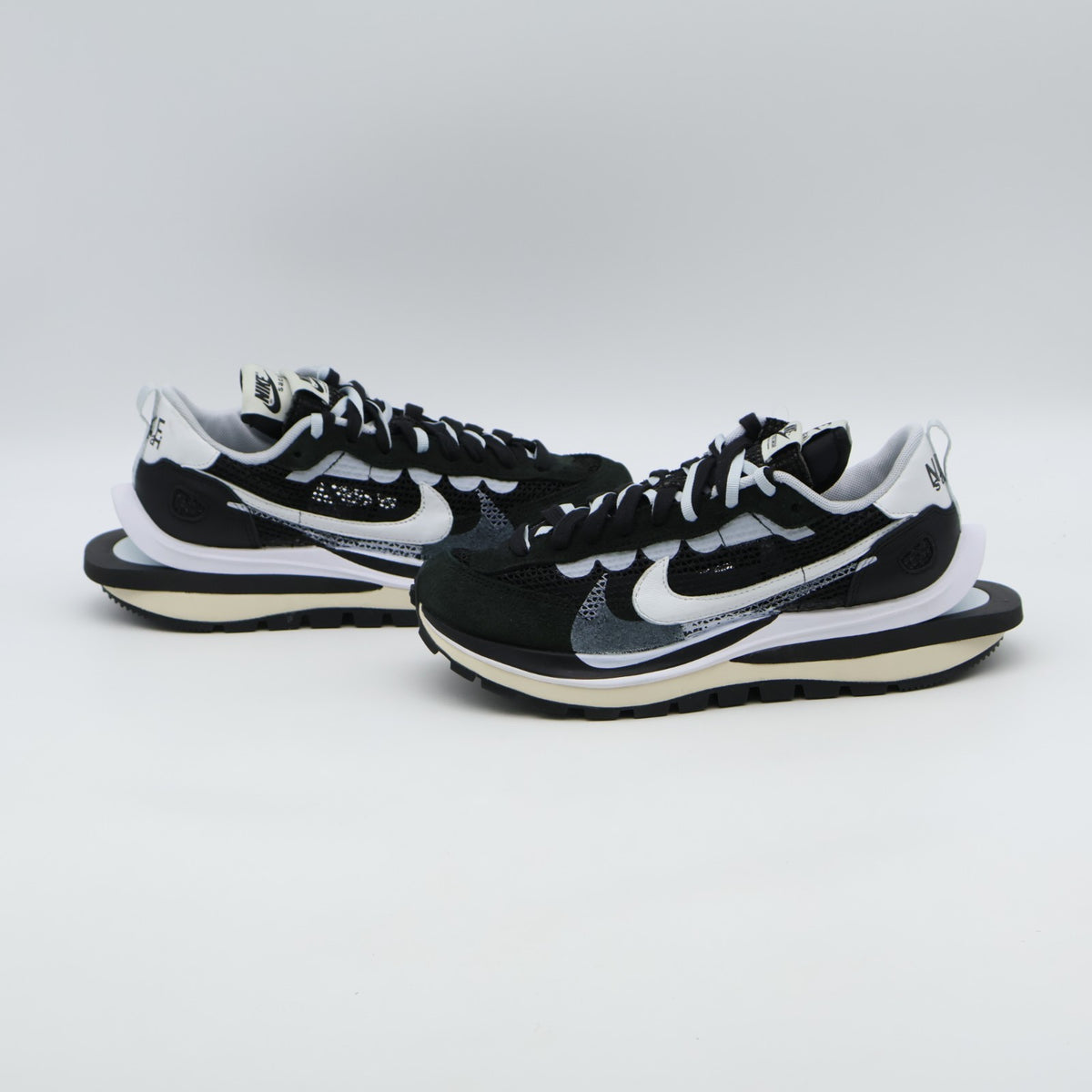 CV1363-001 sacai Ã Nike Vapor Waffle "Black and White" (Men's)